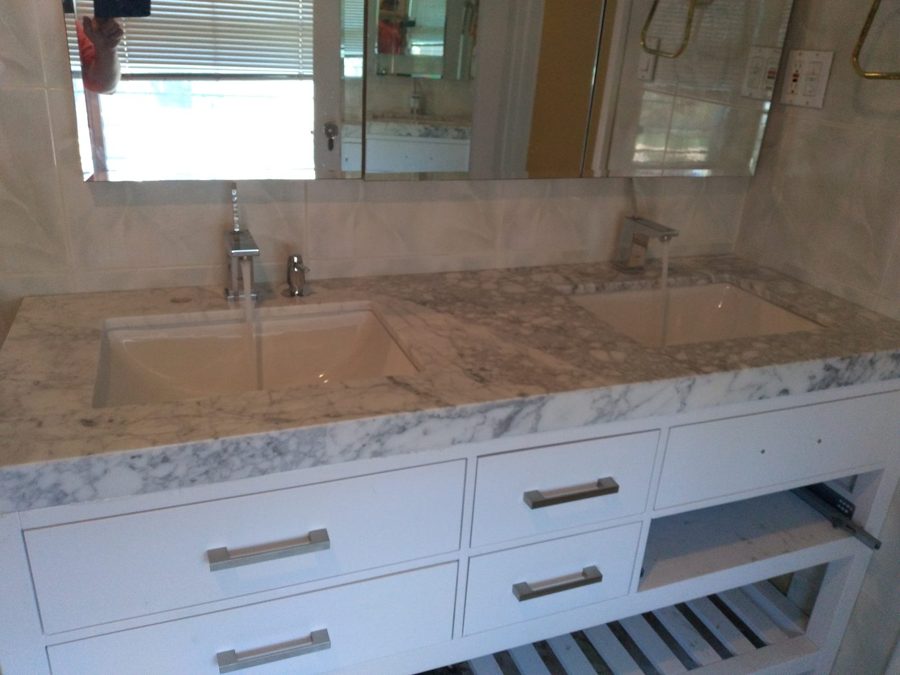 Custom tile floor and wall installation in a Brooklyn bathroom